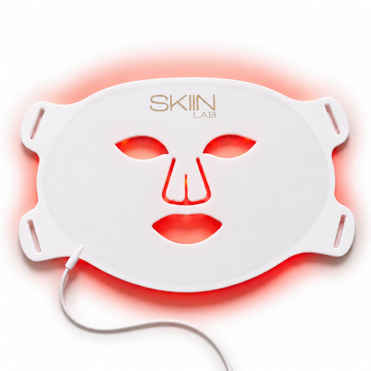 Masque LED rouge visage Lumina 630 allumé, silicone souple blanc et logo SkiinLAB sur fond blanc
